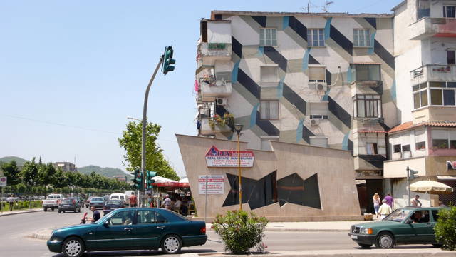 Tirana house-painting project, 2003 - 2nd Tirana Biennial, Albania – 2009 - Photo: Anri Sala
