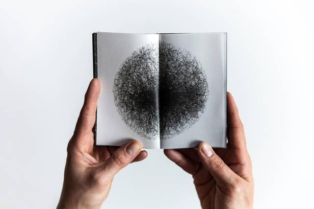Certificate booklet for Mat for multidimensional prayers, 2014 - Photo: María del Pilar García Ayensa / Studio Olafur Eliasson